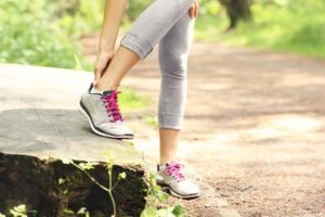 Woman with ankle pain